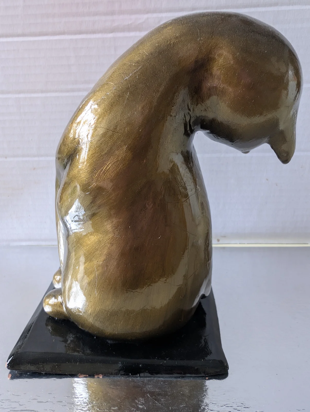 Chat bronze, vue 4